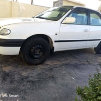 كورلا 2001  السياره جديده  بيها قطعتين رش  بدون دواخل ولا دكت جاكوج  م...