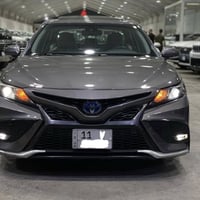 تويوتا كامري2021 هايبرد وارد أمريكي فئة SE فول 1/1 ماشية 85 الف و سيار...