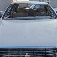 أضرار بسيطة • زجاج باب سائق مكسور • الناصرية