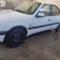 بيجو (405) موديل 2013رقم بغداد مشروع بسمي وطني سنويه لغايه 30 تدفئه تب...