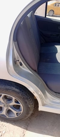 كيا ريو 2005صدر خلفي امامي  جديدتبريد شغال داخله كله جديد تايرات جديده...