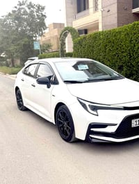 كورلا 2025 S بلاك ادشن رقم بغداد اسمي محرك 1800 هايبرد HEV مري بلاك بل...