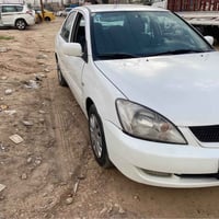 لانسر ٢٠١١ شركة العامه بدون حادث مكفوله من الصبغ كير مكينه تبريد جاهزة...