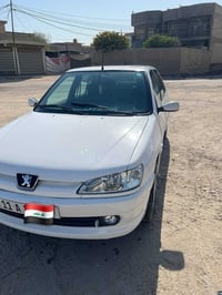 #بلادية_مؤسسة بيجو 306 ابيض موديل 2001 رقم بغداد انگليزي وهزة جديد وال...