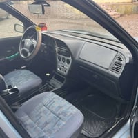 للبيع  بيجو 2001 حره رقم بغداد  مرشوشه جماليه فقط  السياره كلها ب شرط ...