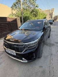 كيا سيلتوز 2023 محرك 2000  وارد أمريكي  رقم بغداد تشغيل عن بعد  رادارا...