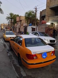 نيسان سني 2002 للبيع مكينه قبق اسود جديده كير اتوماتيك رقم بغداد المان...