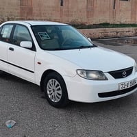 مازدا 323 • ٢٠٠٤ • جير عادي