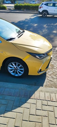 كورلا 21 هايبرد السيارة رقم بغداد بأسمي ماشية 140 حقيقي محرك كير تبريد...