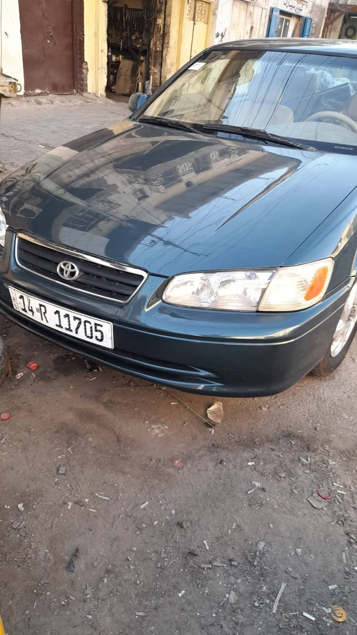 سلام عليكم كامري امريكي 
موديل ٢٠٠٠ رقم بصره  رقم الجديد باسمي سنويه وهزه جديده  تخم تاير  محرك وكير مكفولات كهربائيات كلها شغاله دوشمه جديده مصبوغه عام  حادثها جاملغ امامي   للبيع امراوس حسب القناعه عارضها ٦٥ وبيها مجال للتواصل ***********مكاني بغداد
