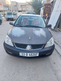 لانسر ٢٠١٠ • رقم بغداد • ضربة خلفية