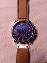 ساعة رجاليه • سير جلد • شغالة