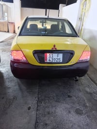 لانسر ٢٠١٠ • مكينه ٢٠٠٠ • كير اوتو