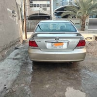 كامري 2004 • وارد امريكي • مضروبة قدام يمين