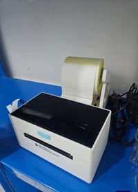 طابعة حرارية • مستعملة مرة • بيها مجال بسيط