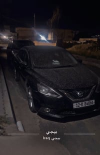 نيسان سنترا 2018 بيها خمس قطع صبغ ومعجون ابيع حزام  سياره رقم نينوى رق...