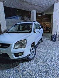 سبورتج 2010 محرك 2.0 خليجي  مبدل قطعتين السعر 110 وبي مجال  العنوان بغ...