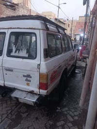 لاندكروز مكينه ففتي تلتالاف كير عادي جدد موديل 82رقم بغداد الماني تحوي...