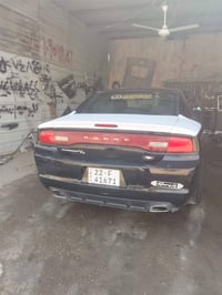 جارجر 13اصل فور ويل ملغي  حادثه بنيد تبديل بدون داخل  وبيها داير جاملغ...