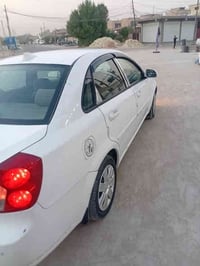 من رخصة الادمن للبيع اوبترا موديل 12 رقم ذيقار انكليزي بسمي اسكن بغداد...