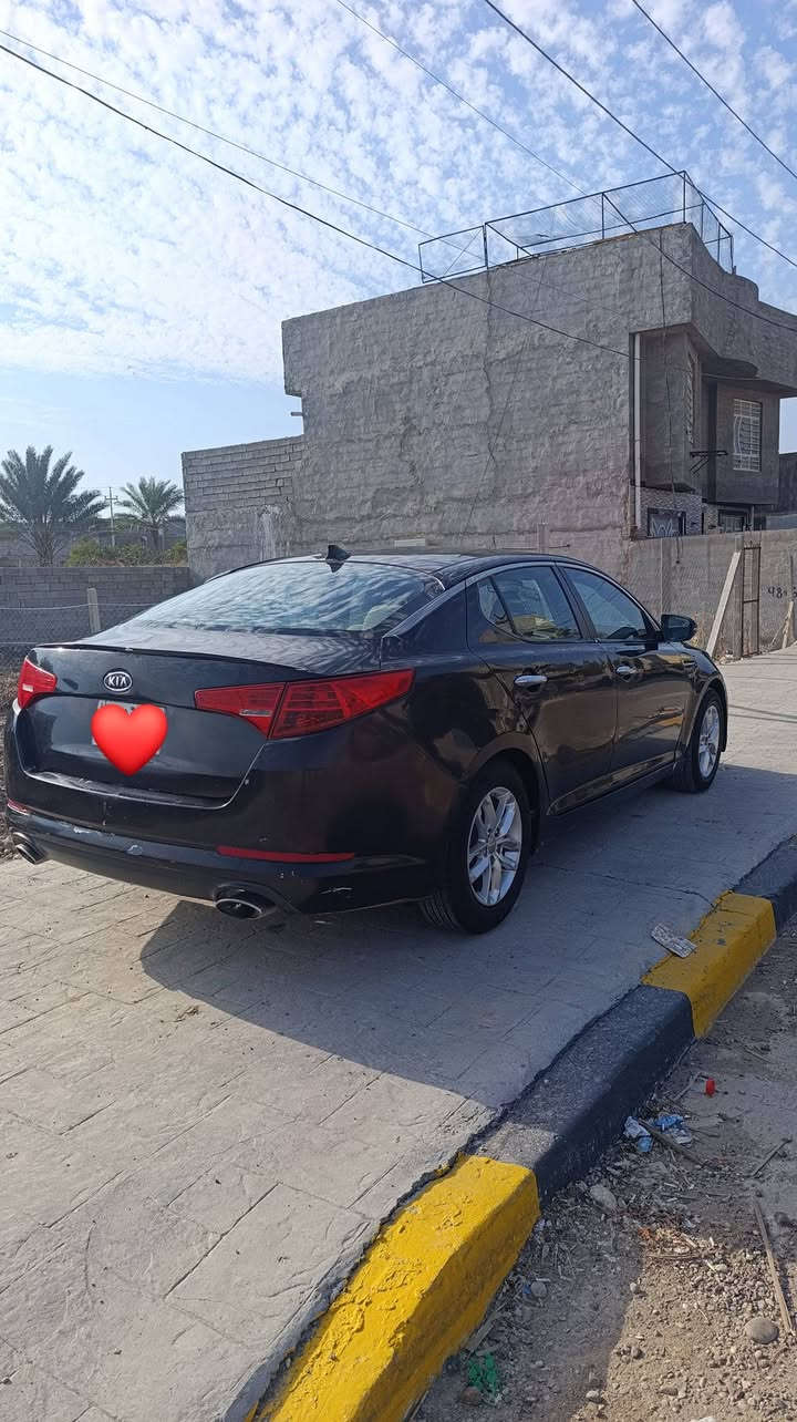 سلام عليكم كيا اوبتيما رقم بغداد  2013 امريكي السياره مصبوغه عام حادثه قبق جنطه السياره جاهزه محرك كير خير من الله حداديه جديده تخم تاير جديد تدفه تبريد كله جاهز. السعر 90
(الرقم ***********) مداور ثاني يوم باسمي السياره
