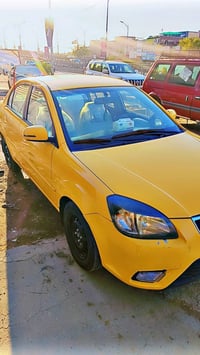 سلام وعليكم كيا ريو لبيع مديل 12 امريكي كير مكينه صدر مكفوله سياره خير...