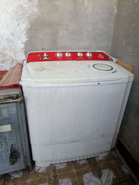غسالة • شبه جديد • ١٤ كيلو
