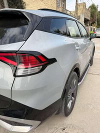 كيا سبورتج SX (2023)  حادثها صبغ باب مع تبديل باب بدون صبغ  السعر 215 ...