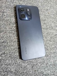 هوت 50i • ١٢٨ • شاشة مكسورة