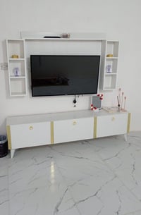 ميز بلازما • طاولة تلفزيون