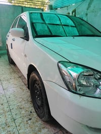متسوبيشي لانسر موديل ١٠ رقم كربلاء دولي بسمي تحويل بغداد كفاله عامه عد...