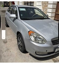 اكسنت ٢٠٠٩ سياره نظيفه ويا كب رقم مميز بغداد باسمي شرط تحويل للون رصاص...