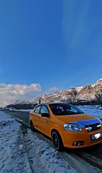 أفيو تكسي • موديل ٢٠١٠ • بطاقة بنزين