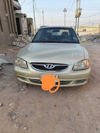 اكسنت ٢٠٠١ • گير اتو • رقم بابل