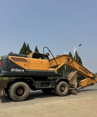 هيونداي • 210W-9 • حفارة عجلات