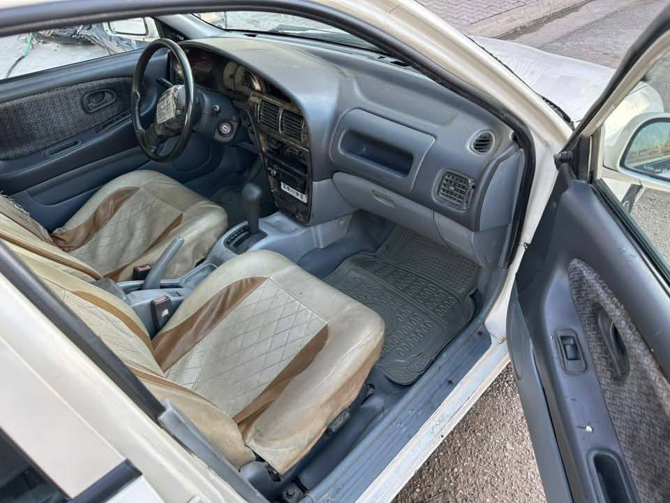 بروتون 2004 بسمي رقم انكليزي
محرك كير كفاله 
صدر جديد 
تخم تاير 
تبريد شغال
تدفه شغاله
بيها طخات بسيطه بدون دواخل 
صبغ بيها مكانات بسيطه جداً 
مكان السياره بغداد الشعله 
سعره47وبيها مجال 
سياره جاهزه  0
***********
