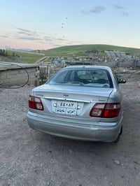 نيسان صني • ٢٠٠٢ • باسمي