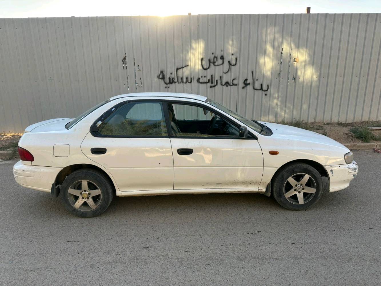 سياره سبارو امبريزا محرك الفين نضيفه + تحويل ثاني يوم السياره بسمي سيارة خير من الله موديل 96 العنوان بغداد الدوره المهديه الثانيه رقم الوتس  تبريد شغال السعر.  
     .....٣٨   ***********
