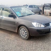 لانسر ٢٠٠٩ • رقم اربيل • شرط الوكاله