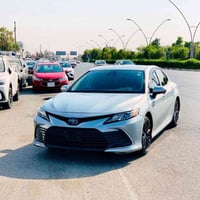 تيوتا كامري  موديل 23 مواصفات le هايبرد لون سلفر داخل اسود  كشن جلد اص...