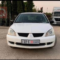 لانسر ٢٠٠٩ • بلا بوية • رقم أربيل