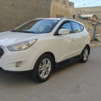 توسان ٢٠١٣ • محرك ٢٠٠٠ • ماشيه ١٧٧ الف