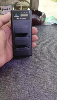 شاحن بطاريات • كاميرا