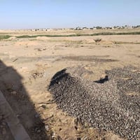 قطعة أرض للبيع تبعد عن الشارع العام 200 متر المساحه دونمين وربع  سعر ا...