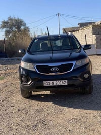 كيا سورنتو موديل 2013لون اسود سياره كير محرك خير من الله 4سلندر وارد ا...