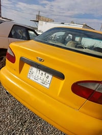 دايو لانوس • بطاقة بنزين • محرك شرط
