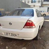 نيسان صني • أبيض • رقم اربيل