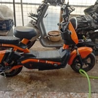 طافية • دراجة كهربائية