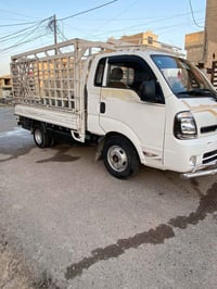 سيارة كيا حمل مكفوله محور 14 تانكي 120 لتر  رقم 07709681387