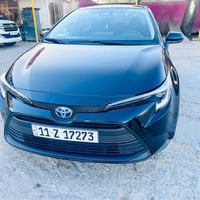 للبيع كورلا هايبرد 2023 وارد امريكي  حادث بسيط موضح في الصور  مرقم بغد...